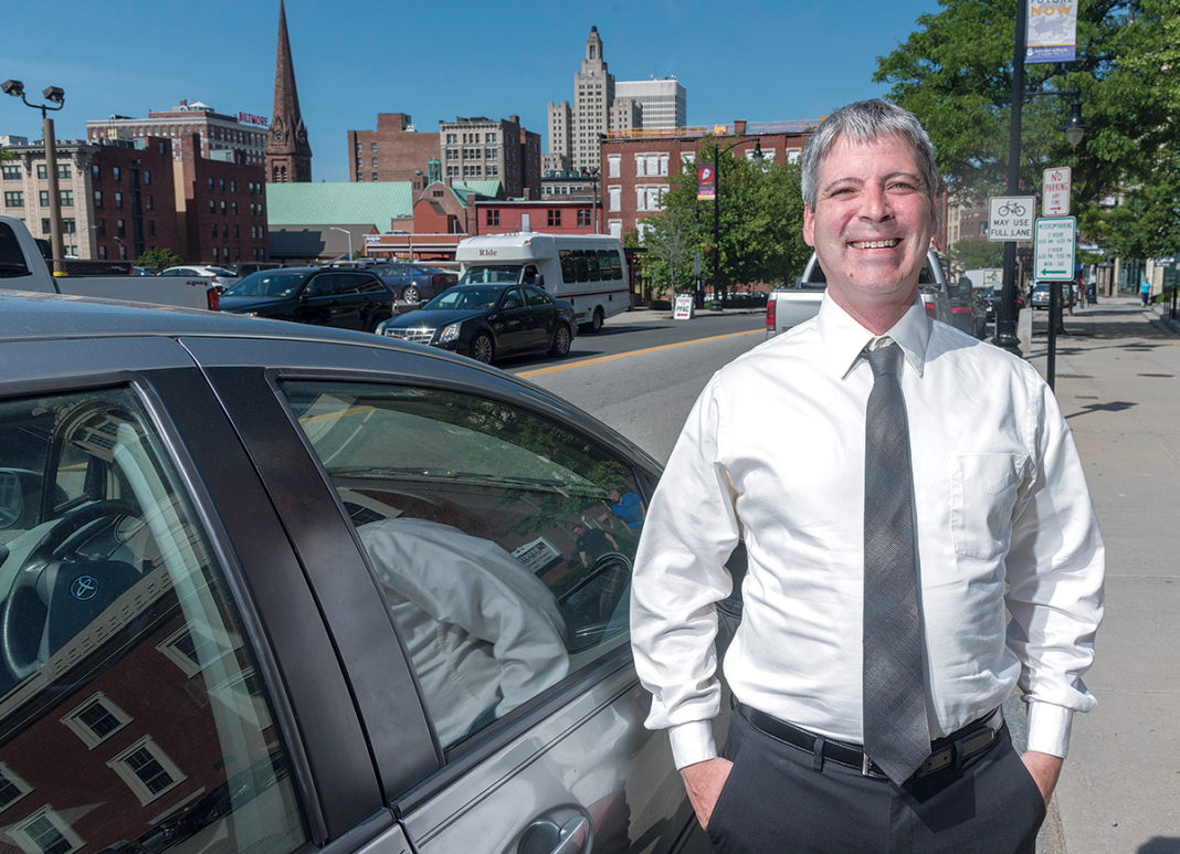 STUCK: Uber and Lyft driver Sean DeLong’s professional background in business-operations management doesn’t lend itself to highly technical jobs, but his education and experience over-qualify him for most low-wage jobs, which has made it difficult for him to find a job since being laid off in 2015. / PBN PHOTO/MICHAEL SALERNO
STUCK: Uber and Lyft driver Sean DeLong’s professional background in business-operations management doesn’t lend itself to highly technical jobs, but his education and experience over-qualify him for most low-wage jobs, which has made it difficult for him to find a job since being laid off in 2015. / PBN PHOTO/MICHAEL SALERNO