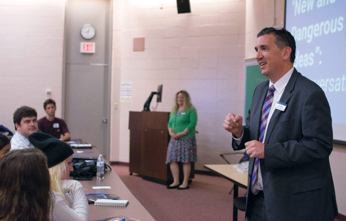 LOCAL HISTORY: Robert Shea, right, associate provost for the advancement of teaching and learning at Roger Williams University, speaks to students during Roger Seminar, which introduces first-year students to Roger Williams as a historical figure by studying texts by Williams and those analyzing his role in local history. / COURTESY ROGER WILLIAMS UNIVERSITY LOCAL HISTORY: Robert Shea, right, associate provost for the advancement of teaching and learning at Roger Williams University, speaks to students during Roger Seminar, which introduces first-year students to Roger Williams as a historical figure by studying texts by Williams and those analyzing his role in local history. / COURTESY ROGER WILLIAMS UNIVERSITY