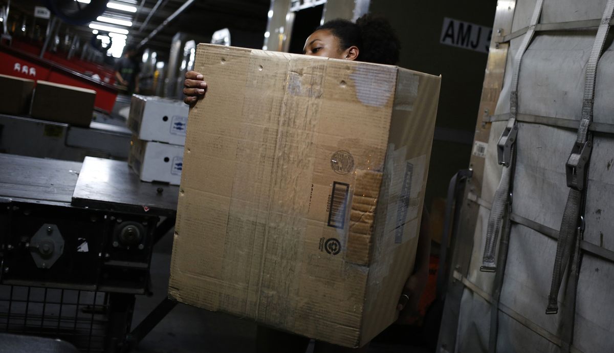 UNITED STATES HIRING ROSE in June, but wage growth did not perform to expectations. / BLOOMBERG FILE PHOTO/LUKE SHARRETT