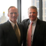 JIM MARLOR (left) of New England Financial Group stands with David C. Porter, managing director of Baystate Financial. COURTESY PHOTO/BAYSTATE FINANCIAL