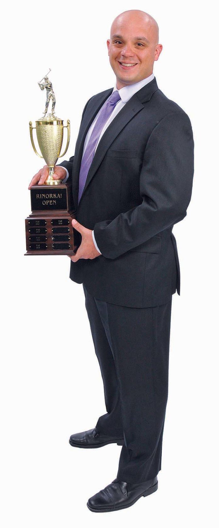 THE PROP: Peter A. Rinaudo shows off his family’s gold trophy, a relic of their annual Rinorka! Open.