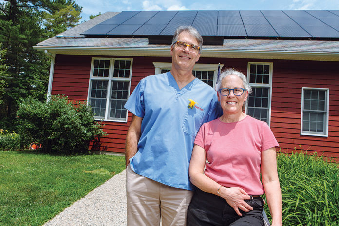 MAKING A DIFFERENCE: Drs. Amy and Ralph Pratt, owners of West Greenwich Animal Hospital, purchased a rooftop solar array, helped in part by a state Renewable Energy Fund grant.  / PBN PHOTO/ RUPERT WHITELEY