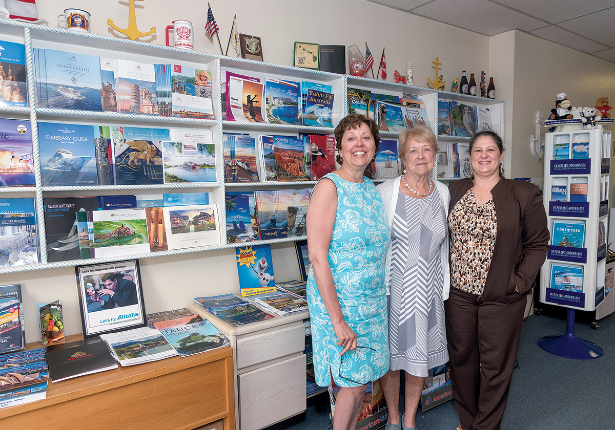 STILL GOING STRONG: Anchor Travel Agency in Pawtucket is celebrating its 40th year in business. From left, Colleen A. Keane, travel consultant and Nancy’s daughter; Nancy McAdams, president; and Beverly J. Costello, travel consultant and Nancy’s daughter-in-law. / PBN PHOTO/MICHAEL SALERNO