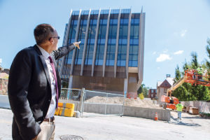NEW FACILITY: Brown University engineering school Dean Larry Larson points to a building under construction for engineering students. / PBN PHOTO/RUPERT WHITELEY