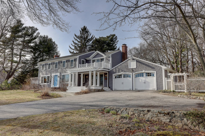 THIS SPACIOUS COLONIAL overlooking Smith's Pond at 14 Quincy Adams Road in Barrington sold in August for $1.1 million. /COURTESY RESIDENTIAL PROPERTIES LTD.