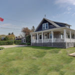THIS FOUR-BEDROOM, SHINGLED cottage sold recently for $900,000, which was the fourth-highest price for a single-family house in Little Compton this year. /COURTESY RESIDENTIAL PROPERTIES LTD.