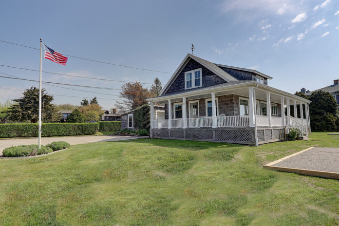 THIS FOUR-BEDROOM, SHINGLED cottage sold recently for $900,000, which was the fourth-highest price for a single-family house in Little Compton this year. /COURTESY RESIDENTIAL PROPERTIES LTD. THIS FOUR-BEDROOM, SHINGLED cottage sold recently for $900,000, which was the fourth-highest price for a single-family house in Little Compton this year. /COURTESY RESIDENTIAL PROPERTIES LTD.