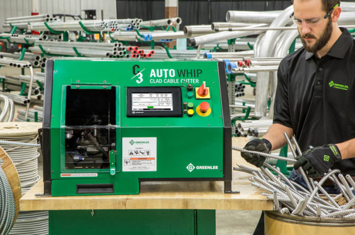 TEXTRON INC. SUBSIDIARY Greenlee has introduced a new automated cable-cutting machine. The C3 Auto Whip machine, shown above, is designed to cut and notch cables more quickly and safely than manually operated machines. / COURTESY GREENLEE TEXTRON INC.