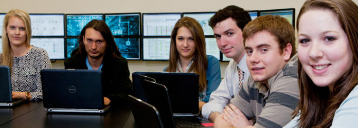 SECURITYDEGREEHUB.COM HAS NAMED the University of Rhode Island among the top 15 schools offering online programs in cybersecurity. Above, students of URI's Digital Forensics and Cyber Security Center, from left: Annemarie Bernier, Nicholas Karayev, Kasey Gesualdi, Ryan Marcotte, Daniel Masterson and Brittany Siter. / COURTESY UNIVERSITY OF RHODE ISLAND