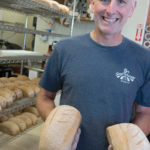 Franchisee: Paul DiBiase BAKER: Paul DiBiase splits his time working part time as a pharmacist and as a baker at his new franchise, Great Harvest Bread Co., in North Kingstown. / PBN PHOTO/MICHAEL SALERNO