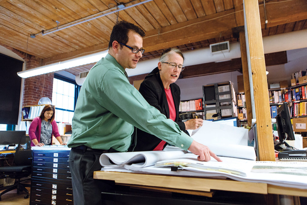 BETTER SYSTEM: Barbara J. Thornton, right, founding partner at Brewster Thornton Group Architects LLP in Providence, collaborates with Brewster partner Nathaniel Ginsburg. Thornton says it would be easier to hire if there was a better Providence public-school system. / PBN PHOTO/RUPERT WHITELEY