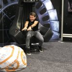 A Star Wars fan attempts to use the force to move a BB-8 beanbag at HasCon on Friday. PBN PHOTO/NICOLE DOTZENROD