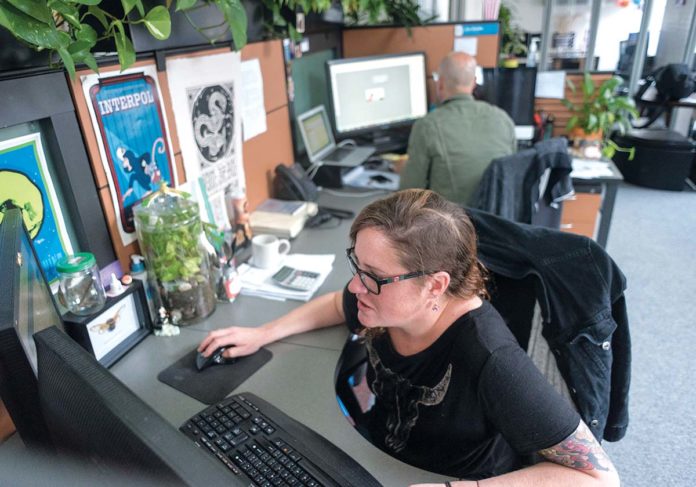 QUICK AND COMPLETE: Envision Technology Advisors’ new Business Continuity Solutions Accelerator is a disaster-recovery program that the IT consultant delivers to clients within 30 business days. Amongst company employees is senior designer Sarah O’Donnell. / PBN PHOTO/MICHAEL SALERNO QUICK AND COMPLETE: Envision Technology Advisors’ new Business Continuity Solutions Accelerator is a disaster-recovery program that the IT consultant delivers to clients within 30 business days. Amongst company employees is senior designer Sarah O’Donnell. / PBN PHOTO/MICHAEL SALERNO