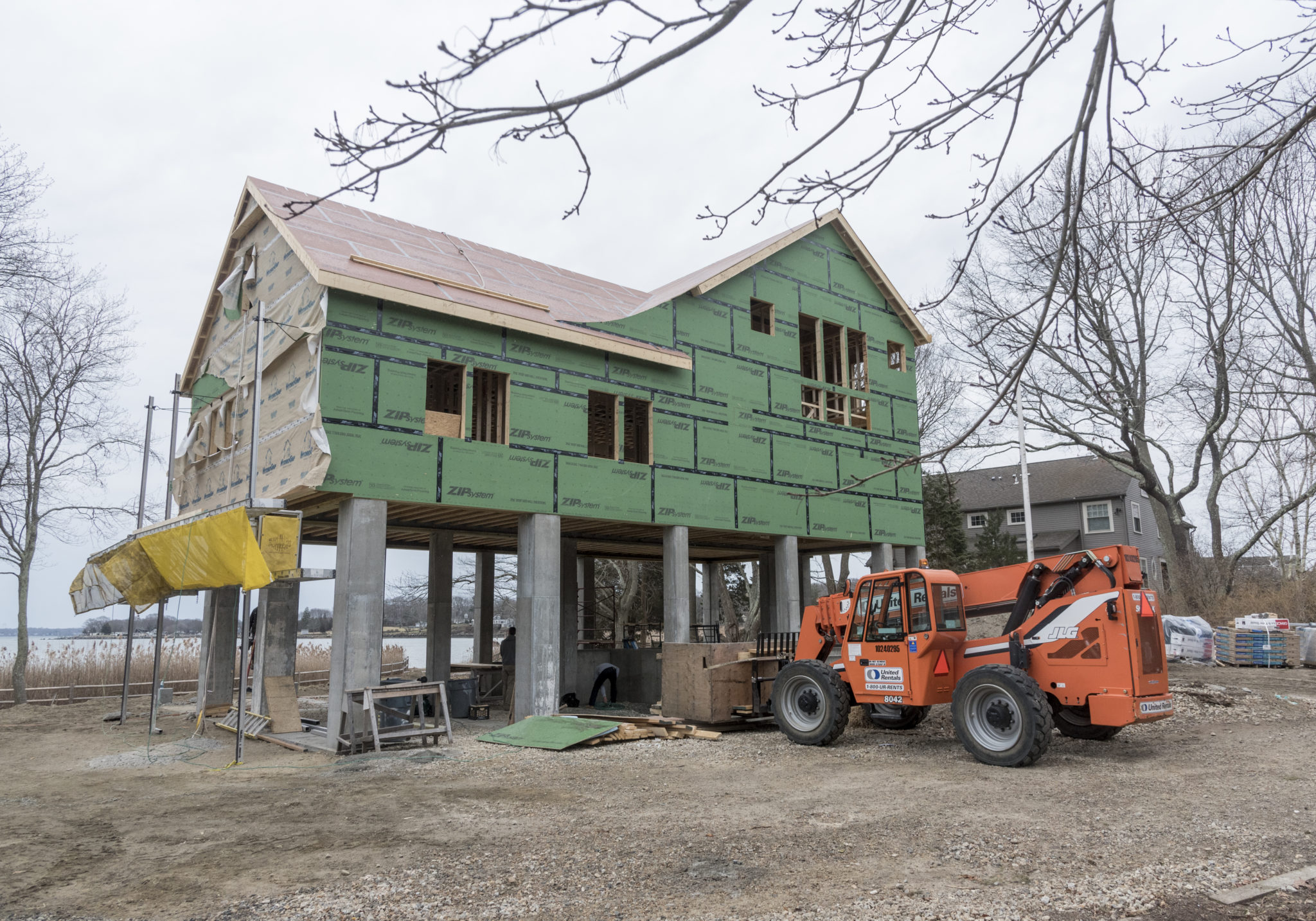 A NEW WAY TO BUILD: This "fortified" house built by Caldwell & Johnson fronts a saltmarsh and Narragansett Bay in Wickford village in North Kingstown and has structural improvements that make it resistant to wind, rain, sea level rise, and other environmental factors. PBN FILE PHOTO/MICHAEL SALERNO