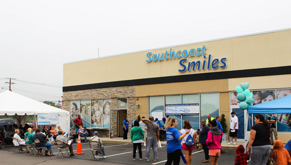 VOLUNTEERS AND DENTAL professionals welcome participants at the 2015 Southcoast Smiles Dentistry from the Heart event. The organization will hold its 10th annual event on Sept. 30. / COURTESY OF SOUTHCOAST SMILES VOLUNTEERS AND DENTAL professionals welcome participants at the 2015 Southcoast Smiles Dentistry from the Heart event. The organization will hold its 10th annual event on Sept. 30. / COURTESY OF SOUTHCOAST SMILES