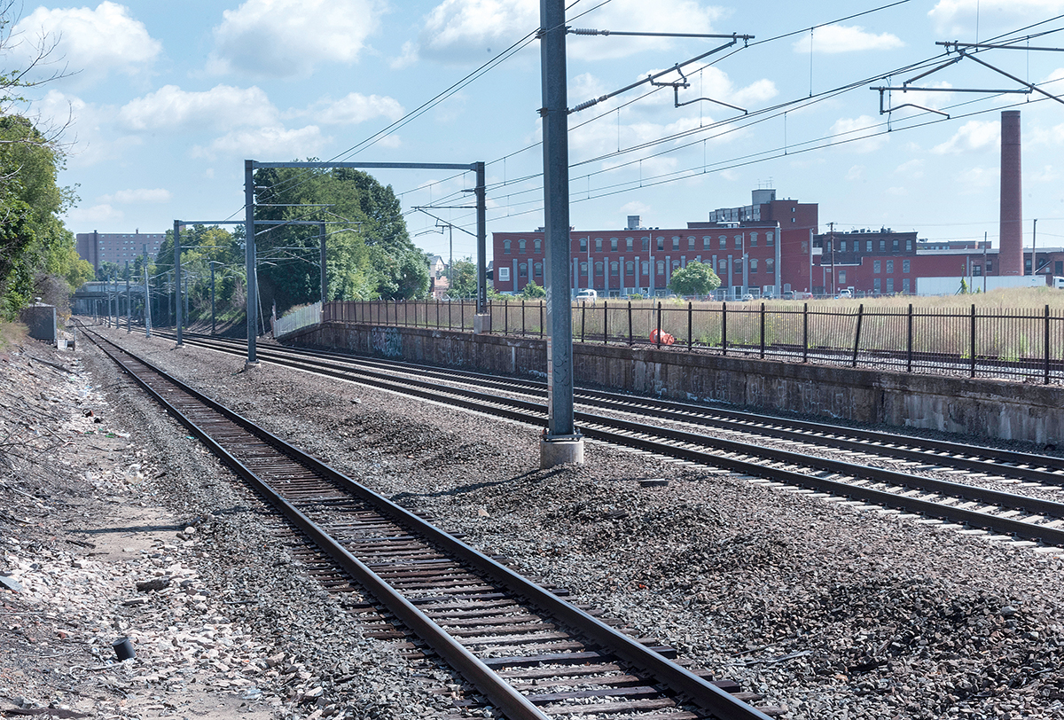 ALL ONBOARD? The planned location of the new Pawtucket-Central Falls Commuter Rail Station is near the small structure on the left side of the tracks and runs across the tracks on both sides. / PBN FILE PHOTO/MICHAEL SALERNO