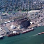 THIS AERIAL PHOTOGRAPH shows ProvPort, with Save The Bay located south of the property, and Johnson & Wales University Harbor Campus located to the southwest. A new $22 million cement-terminal facility was recently built on the site to accept cement shipments. / COURTESY PROVPORT