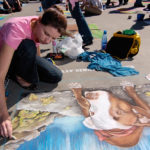 A LOCAL ARTIST displays her work at a recent Providence Rotary Club Street Painting Festival. / COURTESY PROVIDENCE ROTARY CLUB