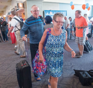 MAIDEN VOYAGE: Husband and wife Ray and Christine Tardie, originally of North Smithfield, now live in Punta Gorda, Fla. They were among the passengers on the first flight of Allegiant Air to arrive at T.F. Green Airport. / PBN PHOTO/MICHAEL SALERNO