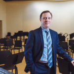 Under David Beauchesne’s leadership, the Rhode Island Philharmonic Orchestra and Music School is seeing  audience and enrollment growth, as well as deeper reach into the community. He earned bachelor of music and master of music in music education  degrees from the Eastman School. / PBN PHOTO/RUPERT WHITELEY