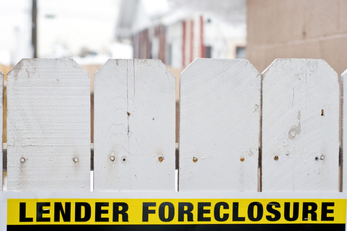 MORTGAGE DELINQUENCY RATES in the Providence metropolitan area in August declined year over year, in line with a national trend. / BLOOMBERG FILE PHOTO/DAVID CALVERT MORTGAGE DELINQUENCY RATES in the Providence metropolitan area in August declined year over year, in line with a national trend. / BLOOMBERG FILE PHOTO/DAVID CALVERT