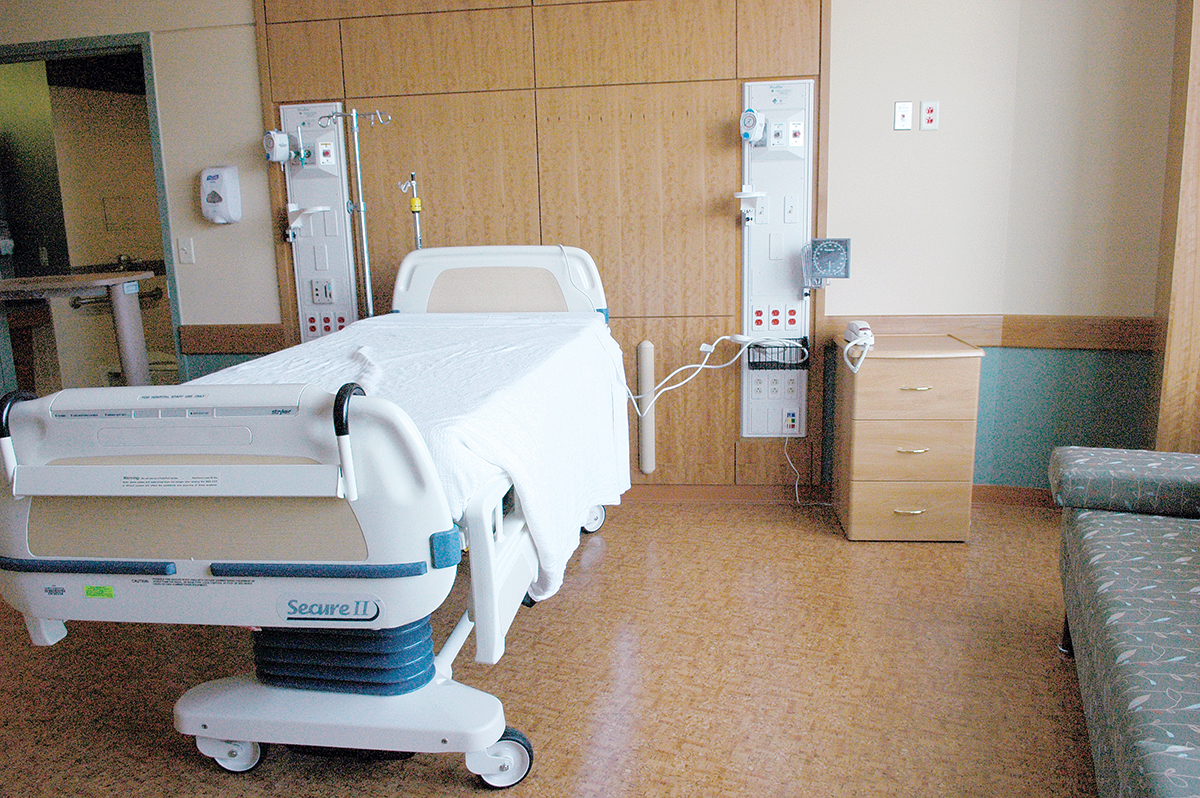 SURPLUS: With most Rhode Island hospitals experiencing a decline in patients since 2006, and falling demand for inpatient services, the state has a surplus of hospital beds. Shown above is a patient room from The Miriam Hospital in Providence. / COURTESY ­LIFESPAN CORP.