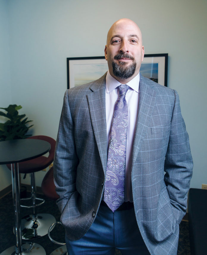 After nearly two decades in the mortgage industry, David Currie founded Province Mortgage Associates with a vision that included exceptional customer service at its core. / PBN PHOTO/RUPERT WHITELEY