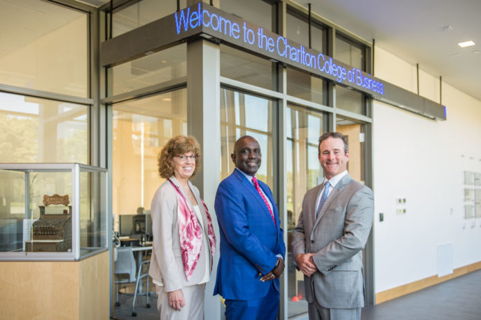 PICTURED IN THE University of Massachusetts Dartmouth’s new Charlton College of Business Learning Pavilion to commemorate the $100,000 gift from Mechanics Cooperative Bank are, from left: Kathryn Carter, dean of the Charlton College of Business; Robert E. Johnson, chancellor of UMass Dartmouth; and Joseph T. Baptista Jr., president and CEO of Mechanics Cooperative Bank, which committed $100,000 in support of the new space and the university as a whole. / COURTESY MECHANICS COOPERATIVE BANK