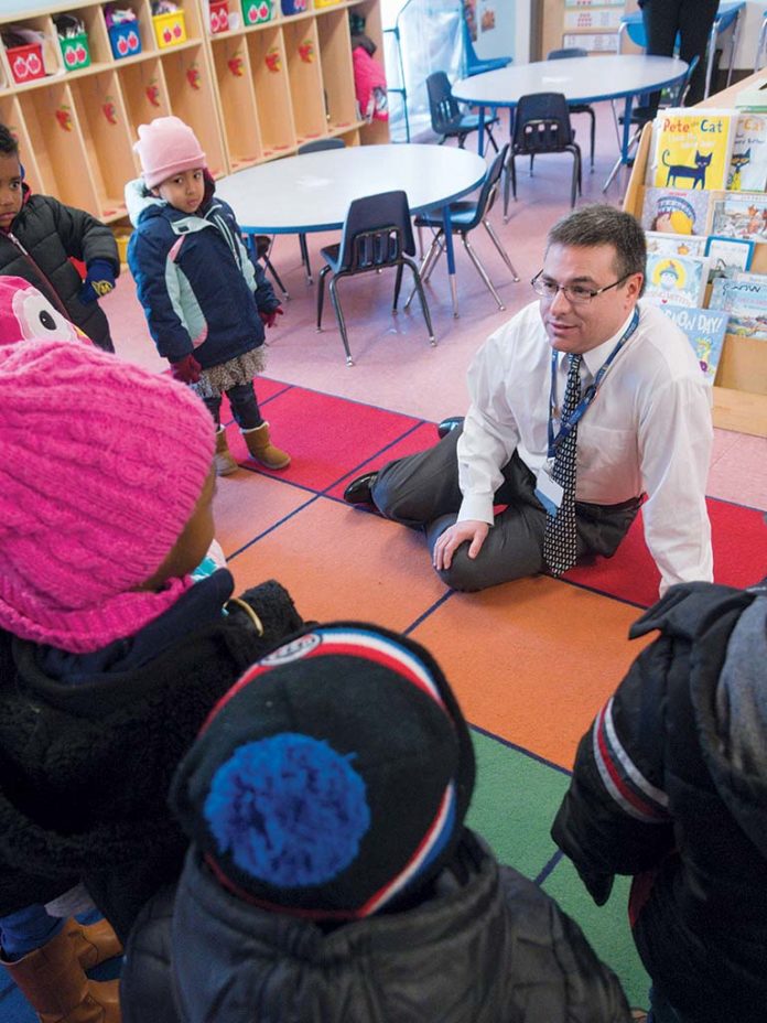 FLEXIBLE DOLLARS: David Caprio, president of Children’s Friend, a nonprofit social service and education agency in Providence, speaks to the kids at Friendship Center. Caprio says although individual and corporate donations make up less than 10 percent of the nonprofit’s budget, those are its most flexible dollars. / PBN PHOTO/MICHAEL SALERNO FLEXIBLE DOLLARS: David Caprio, president of Children’s Friend, a nonprofit social service and education agency in Providence, speaks to the kids at Friendship Center. Caprio says although individual and corporate donations make up less than 10 percent of the nonprofit’s budget, those are its most flexible dollars. / PBN PHOTO/MICHAEL SALERNO