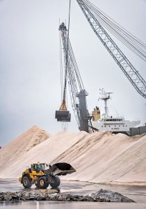 On The cover OFFLOADING: The Elizabeth River, out of Hong Kong, offloads 60,000 tons of salt at the Port of Providence. Rhode Island’s only foreign trade zone includes a port and two other locations. Rhode Island has applied for a statewide foreign trade zone. / PBN PHOTO/MICHAEL SALERN