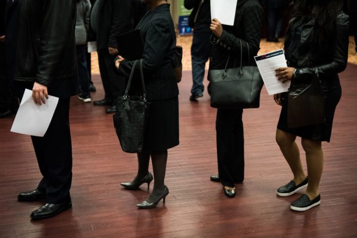 United States job openings fell in November to a six-month low . /BLOOMBERG FILE PHOTO/MARK KAUZLARICH