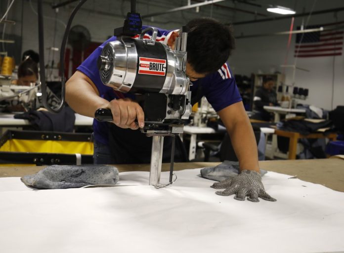 U.S. MANUFACTURING expanded in December at the fastest pace in three months. / BLOOMBERG FILE PHOTO/JIM YOUNG U.S. MANUFACTURING expanded in December at the fastest pace in three months. / BLOOMBERG FILE PHOTO/JIM YOUNG