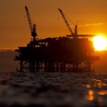 DCOR LLC's Edith offshore oil and gas platform stands at sunset in the Beta Field off the coast of Long Beach, Calif. /BLOOMBERG FILE PHOTO/TIM RUE