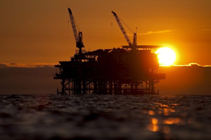 DCOR LLC's Edith offshore oil and gas platform stands at sunset in the Beta Field off the coast of Long Beach, Calif. /BLOOMBERG FILE PHOTO/TIM RUE DCOR LLC's Edith offshore oil and gas platform stands at sunset in the Beta Field off the coast of Long Beach, Calif. /BLOOMBERG FILE PHOTO/TIM RUE