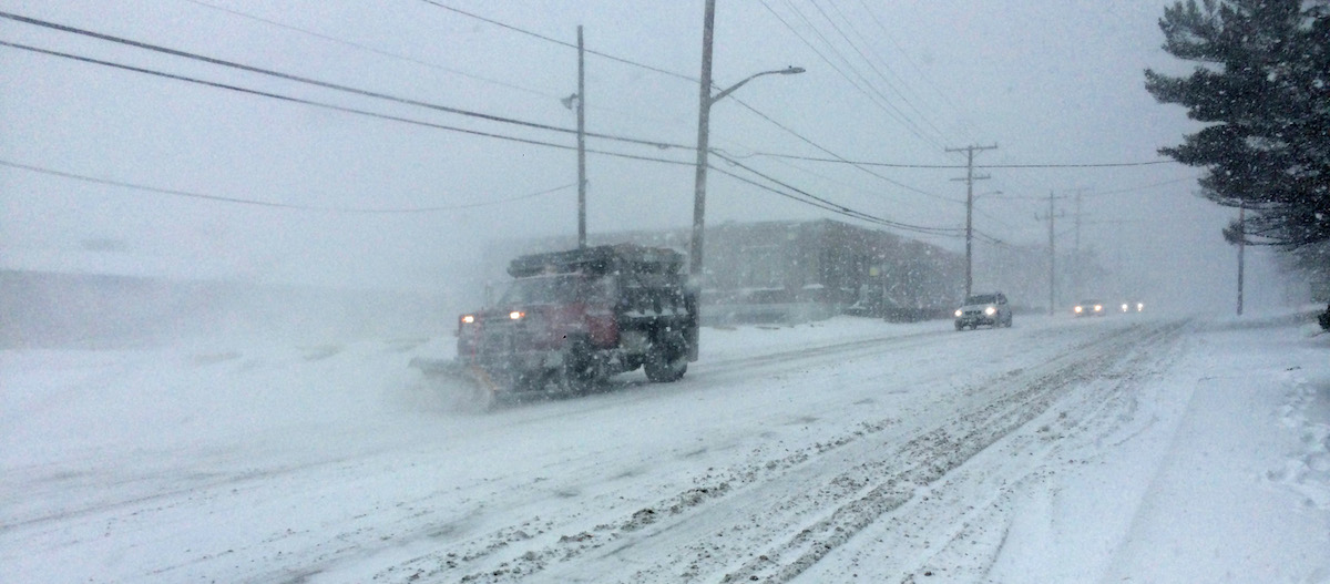 A PLOW TRUCK CLEARING THE ROADS on Elmwood Ave. in Cranston. / PBN FILE PHOTO/ROB BORKOWSKI