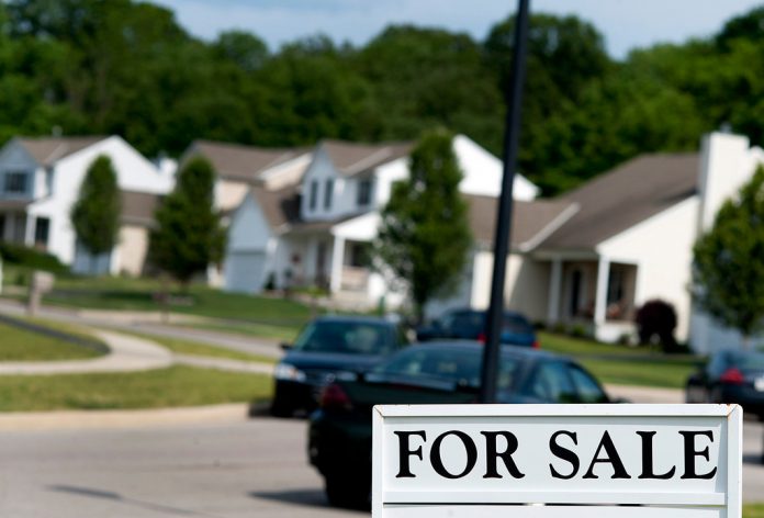 MASSACHUSETTS SINGLE-FAMILY home sales in December declined 6.6 percent year over year. / BLOOMBERG FILE PHOTO/TY WRIGHT MASSACHUSETTS SINGLE-FAMILY home sales in December declined 6.6 percent year over year. / BLOOMBERG FILE PHOTO/TY WRIGHT