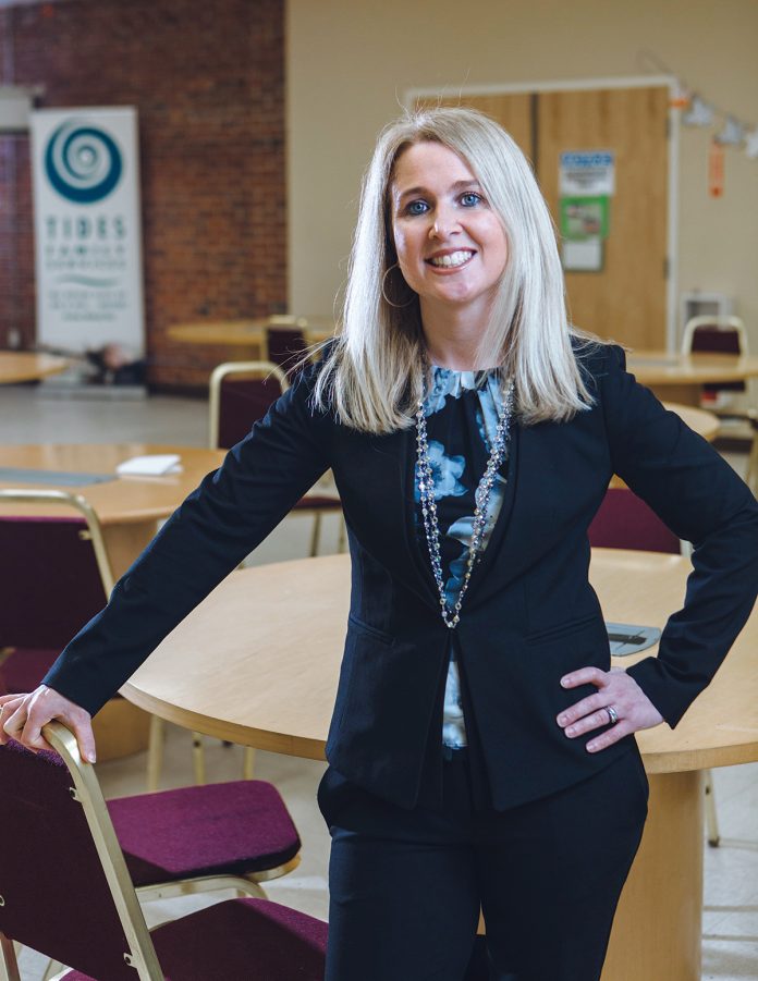 Beth Bixby has worked at Tides Family Services for more than 17 years. Never in her wildest dreams did she anticipate following Brother Michael Reis, the founder and now chief visionary officer, as CEO.  / PBN PHOTO/RUPERT WHITELEY