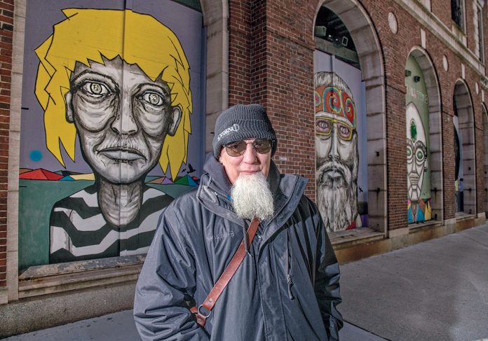 A CELEBRATION AND AN INTERVENTION: AS220 founder Bert Crenca has installed a series of five murals on the historical façade of the Providence National Bank in the city to celebrate the city’s diversity.  / PBN PHOTO/ MICHAEL SALERNO