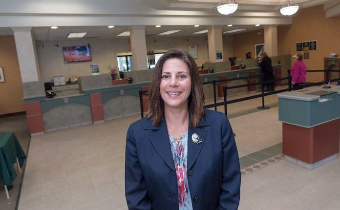 AMY MARTEL, executive vice president and chief operating officer of People’s Credit Union, shown inside the Middletown branch, has been named chairperson of the Newport County Chamber of Commerce. / PBN FILE PHOTO/MICHAEL SALERNO
