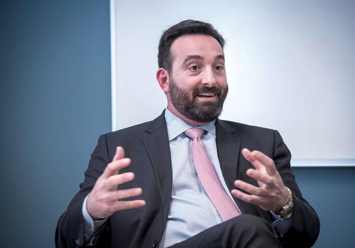 ON THE JOB: As Jesse Saglio begins his tenure as president of the R.I. Commerce Corp., he must help the state attract businesses, while helping local companies thrive.  / PBN PHOTO/ MICHAEL SALERNO