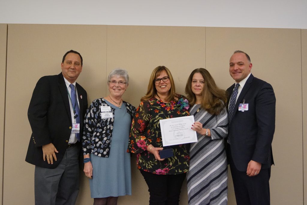 JENNIFER SILVA won the Noreen Mattis Award for Excellence in Patient and Family Centered Care recently presented at Women & Infants Hospital’s sixth annual Patient, Family, and Community Centered Care Summit on Jan. 24. Pictured from left: Dr. Robert Insoft, senior vice president of quality and chief medical officer; Noreen Mattis; Silva; Therese Stafford, 2016 Noreen Mattis Award winner; and Matt Quinn, senior vice president of patient care services and chief nursing officer. / COURTESY WOMEN & INFANTS HOSPITAL