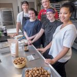 SPENT GRAIN: OurGrain is a startup that reuses grain from beer-making to create other products, such as bagel bites and cookies. Co-founders from left: (rear) ­Victor Eng and Sam Burges, (front) ­Samantha Gannon, Nicole Gresko and Natasha B. Daniels. / PBN PHOTO/MICHAEL SALERNO