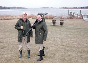 WATERPROOF: Simon Dewar, right, general manager of the Weekapaug Inn in Westerly, and in-house naturalist Mark Bullinger wear waterproof apparel, including boots, available to guests through the inn’s Hunter Boots lending closet. / PBN PHOTO/BRIAN MCDONALD