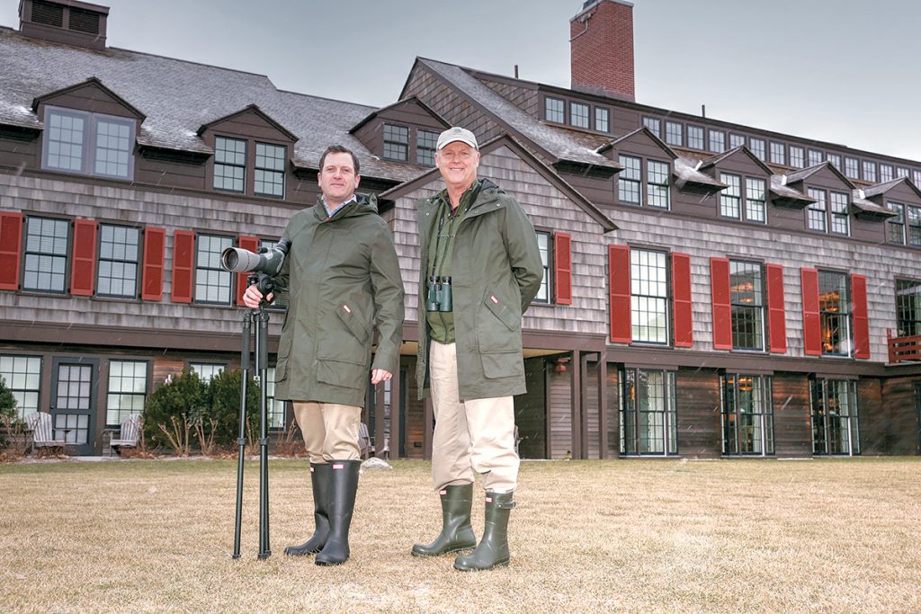 PARTNERSHIP: Above, Mark Bullinger, right, in-house naturalist, and General Manager Simon Dewar on the grounds of the Weekapaug Inn on the shore of Quonochontaug Pond in Westerly. / PBN PHOTO/BRIAN MCDONALD