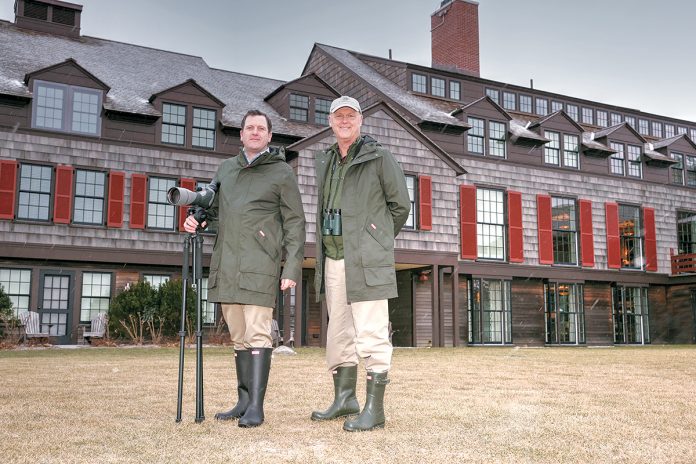 PARTNERSHIP: Above, Mark Bullinger, right, in-house naturalist, and General Manager Simon Dewar on the grounds of the Weekapaug Inn on the shore of Quonochontaug Pond in Westerly. / PBN PHOTO/BRIAN MCDONALD PARTNERSHIP: Above, Mark Bullinger, right, in-house naturalist, and General Manager Simon Dewar on the grounds of the Weekapaug Inn on the shore of Quonochontaug Pond in Westerly. / PBN PHOTO/BRIAN MCDONALD