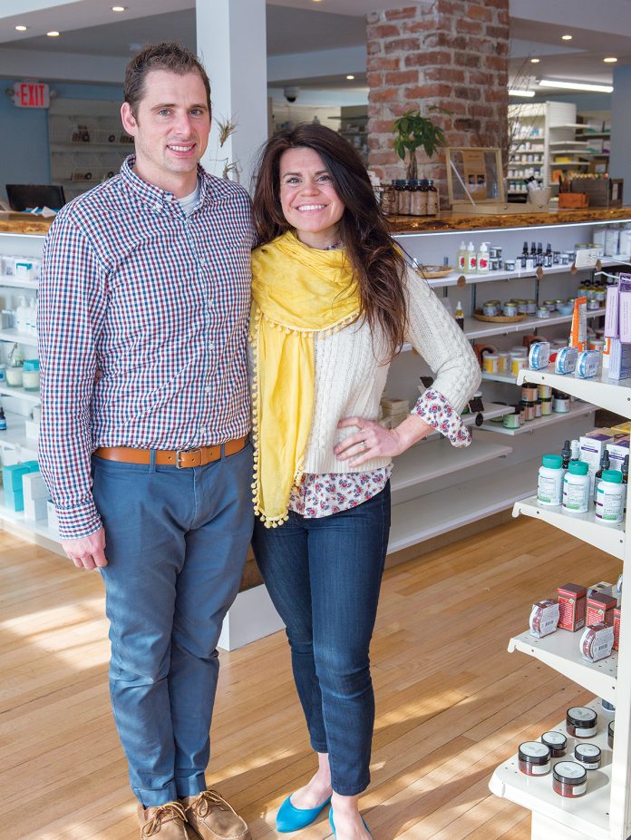 HOMEGROWN: Owners ­Matthew and Erika Olivier sell locally made health and beauty products at Matt’s Local Pharmacy in ­Middletown. / PBN PHOTO/KATE WHITNEY LUCEY