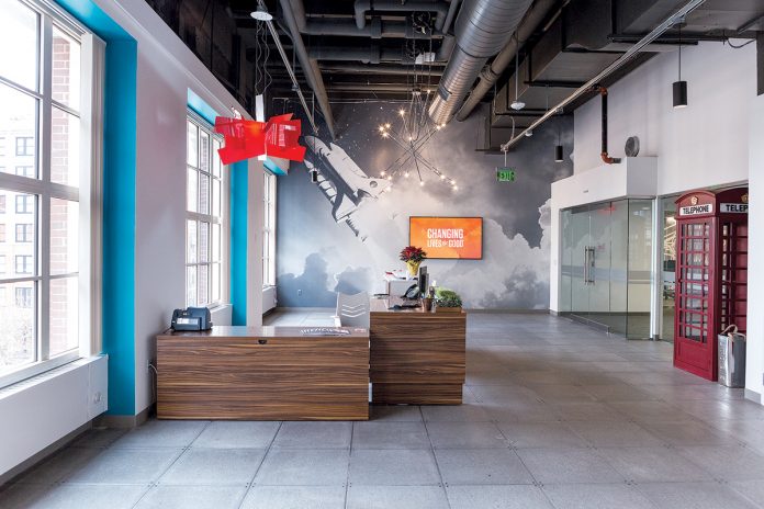HEALTHY ENVIRONMENT: The building materials for Virgin Pulse’s new corporate headquarters in Providence were selected with a focus on sustainability, recycled content and green certifications for improved air quality.
