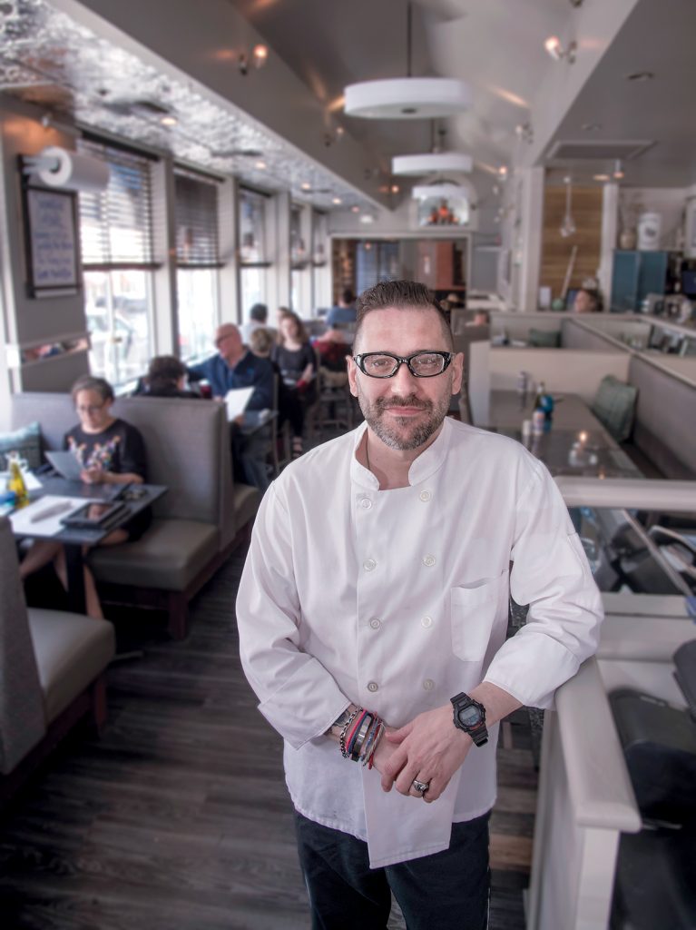 BACK IN BUSINESS: Nick Makris is the owner of Greek-American restaurant Andreas in Providence, which just reopened after extensive renovations following a burst pipe in January. / PBN PHOTO/MICHAEL SALERNO