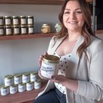 SCENTED CANDLES: Catherine Kwolek is the owner of Aster Candle, a recently launched homemade-candle business in Lincoln. Her coffee milk scented jar candle is a best-seller. / PBN PHOTO/MICHAEL SALERNO