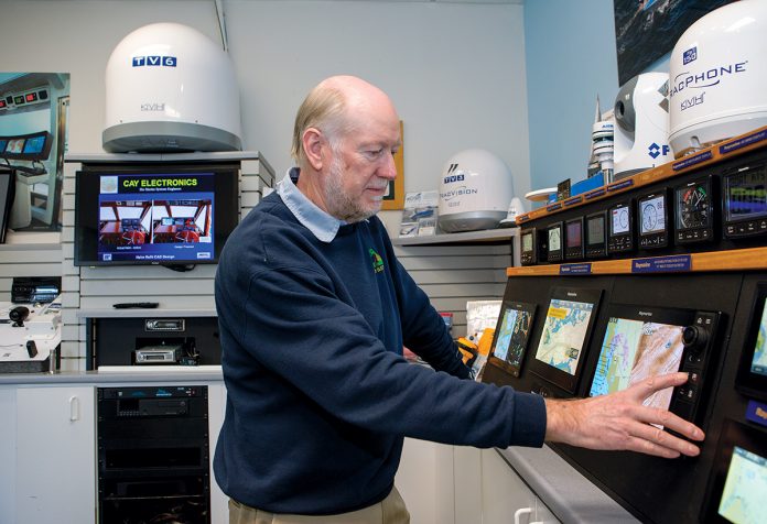 MARINE NAVIGATION: Cay Electronics owner Rufus Van Gruisen in the showroom at the company’s headquarters in Portsmouth. Cay supplies, installs and repairs marine navigation and other electrical systems for yachts and powerboats. / PBN PHOTO/KATE WHITNEY LUCEY